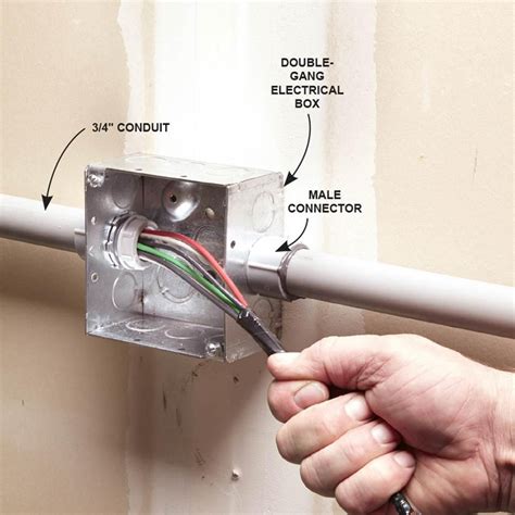 how to pop up conduit holes from plastic electrical box|filling plastic boxes.